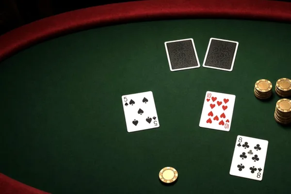 Playing cards on felt illustrating CroreBet account access.
