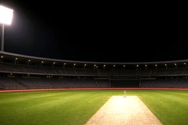 A cricket ground at night on the CroreBet app page.