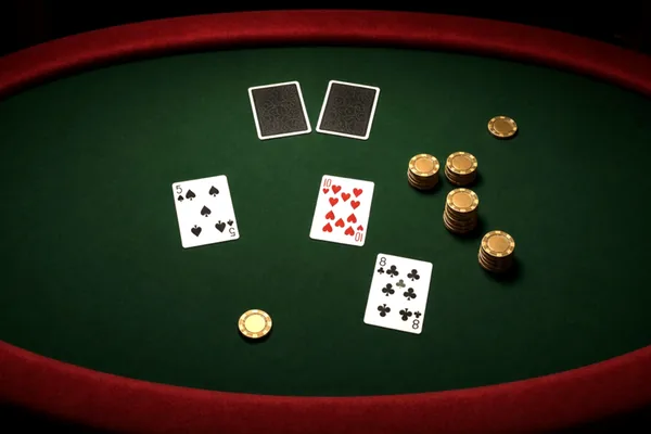Cards on felt illustrating CroreBet privacy copy.